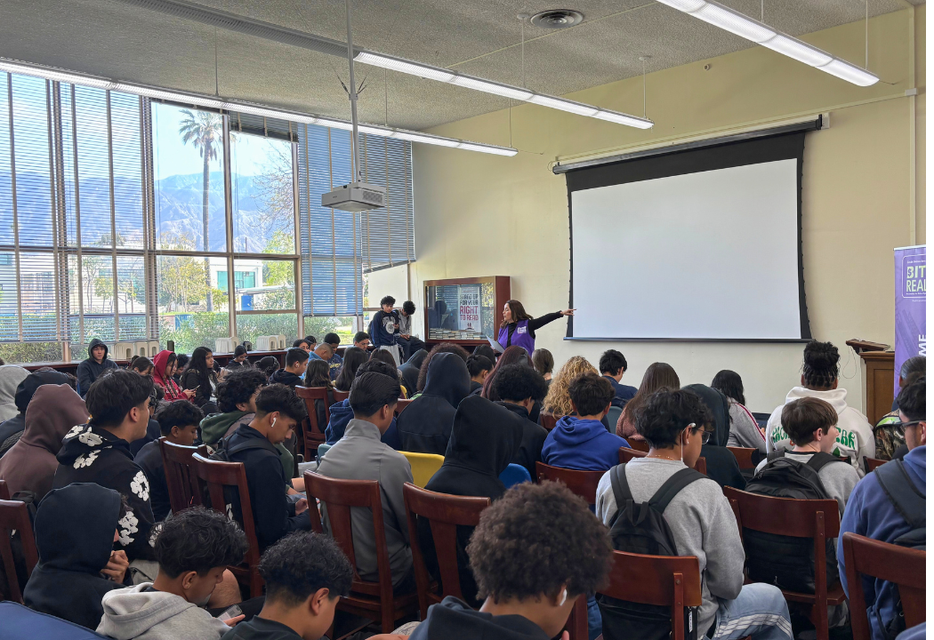 Guest speaker talking in front of students.